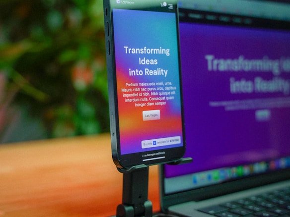 Success Stories 1 Smartphone and laptop displaying a website for parlot AI automation solutions transforming ideas into reality